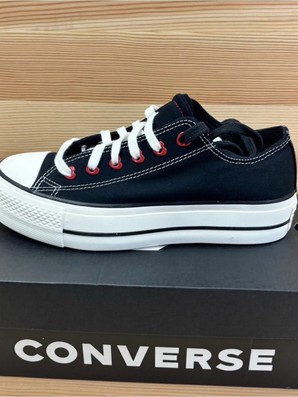 Converse Women’s Black Canvas Sneakers with Red heart Eyelets. A19059C